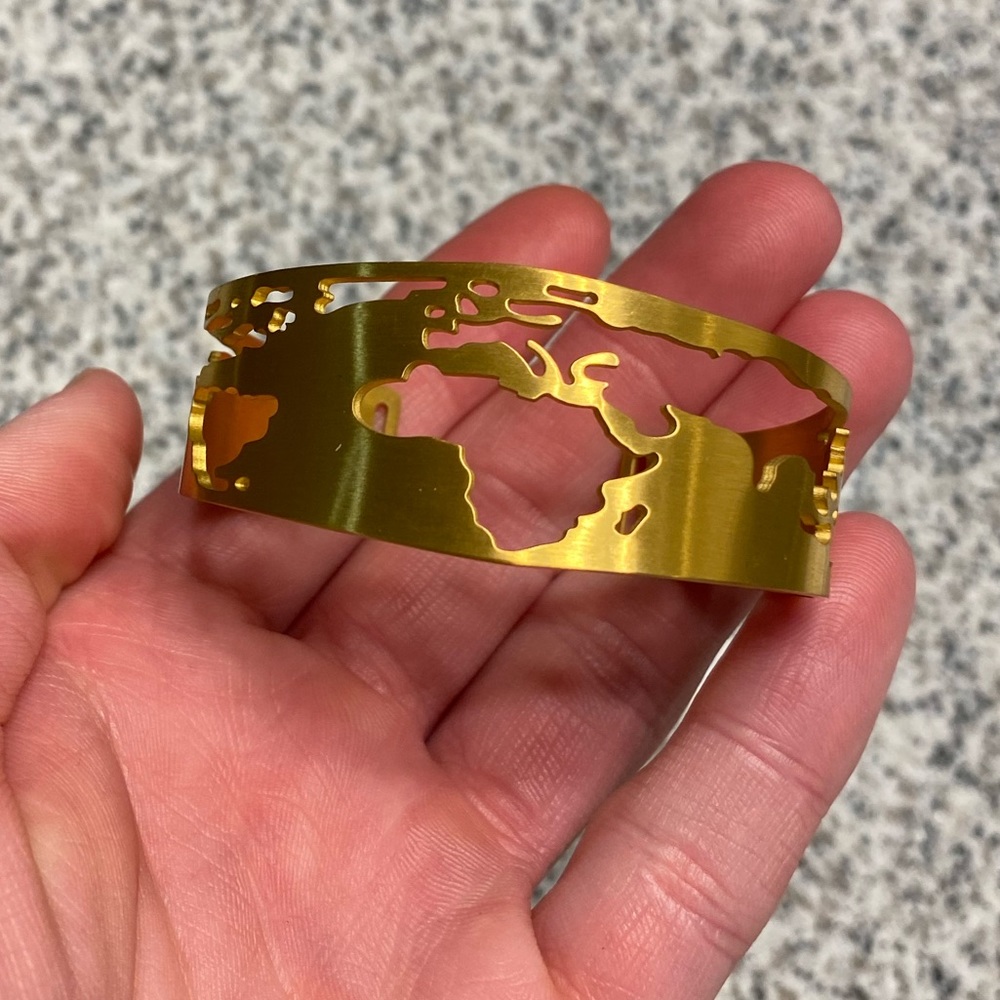 Cuffed Around The World Bracelet, by Tristen Ikaika